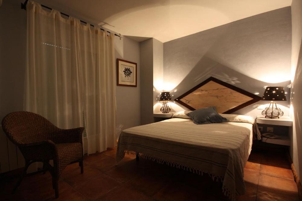 Posada Tresmentiras Aldeanueva del Camino Rum bild